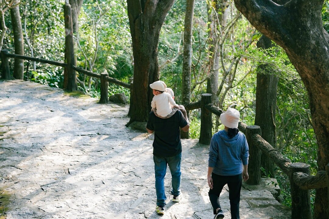 senior couple hiking in forest
